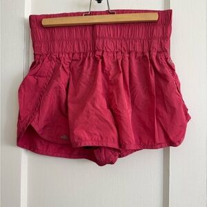 Free People High-Waist Smocked Running Shorts in Bright Pink